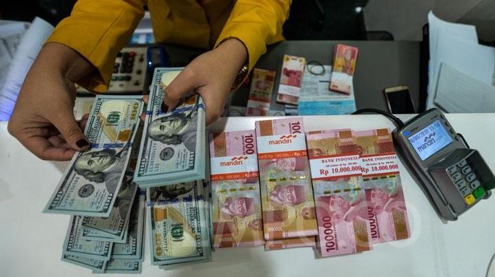 Kurs mata uang rupiah (Foto: Tribun)