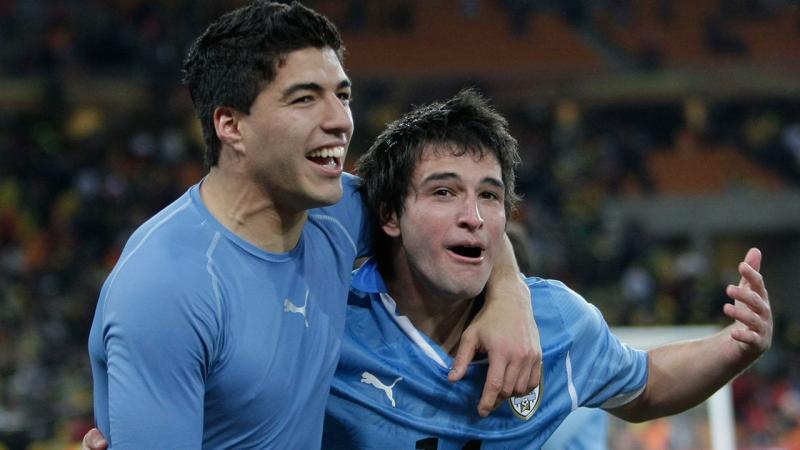 Luis Suarez (kiri) (Andrew Boyers/Action Images)