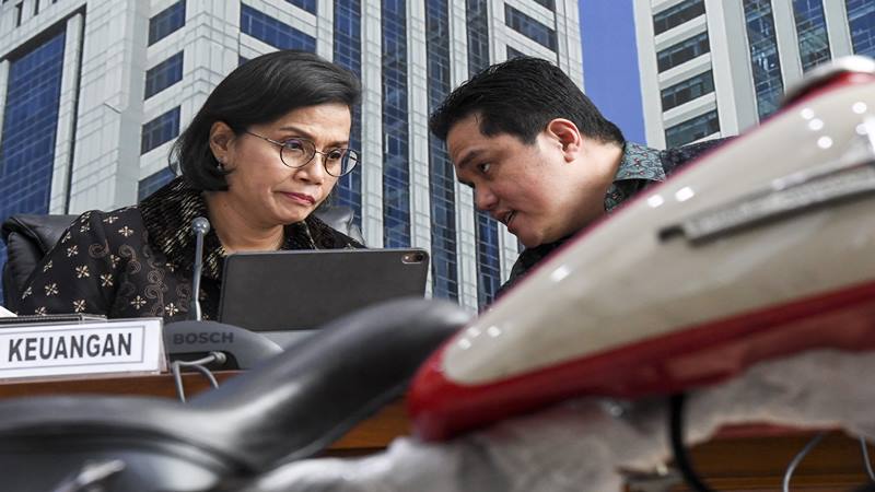 Menteri Keuangan Sri Mulyani dan Menteri BUMN Erick Thohir. (Bisnis).