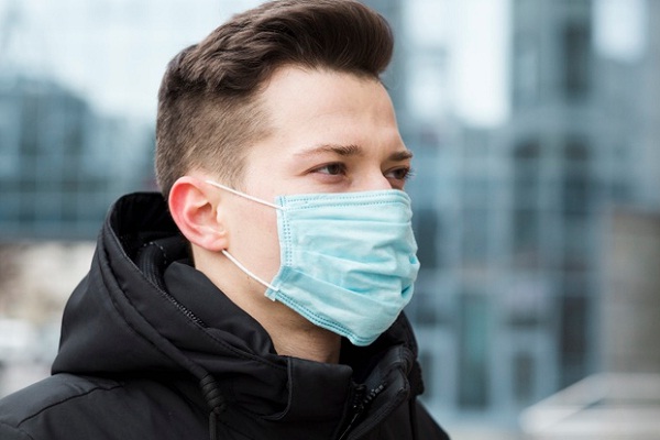 Ilustrasi pengunaan masker (Foto:Solopos.com)