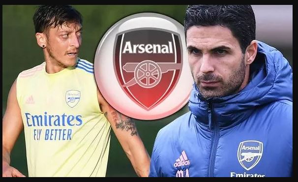 Mesut Ozil dan Mikel Arteta (Foto: Getty)